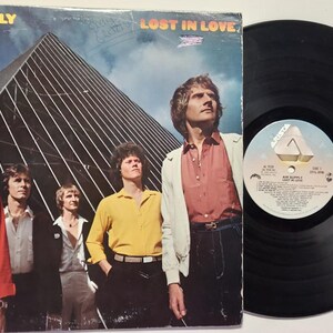 Vintage 1980 Vinyl Record Album by Air Supply titled Lost In Love