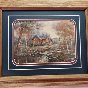Framed in Oak and matted 14 x 17 wilderness art  print by Carl Valente titled Luminescent Brook