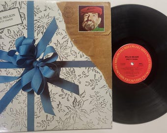 Vintage 1979 Christmas Vinyl Record Album by  Willie Nelson titled  Pretty Paper