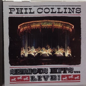CD Used  1990 Vintage Music by Phil Collins titled Serious Hits...Live!