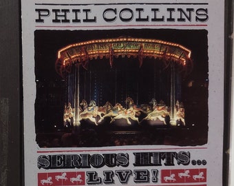 CD Used  1990 Vintage Music by Phil Collins titled Serious Hits...Live!