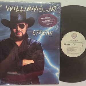 Vintage 1988 Vinyl Record Album by Hank Williams Jr. titled Wild Streak