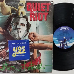Vintage 1984 Vinyl Record Album by Quiet Riot titled Condition Critical