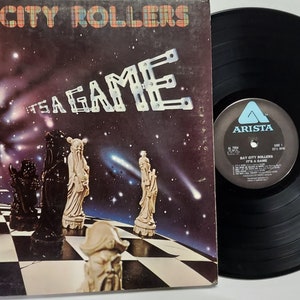 Vintage 1977 Vinyl Record Album by Bay City Rollers titled It&#39;s A Game