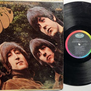 Vintage 1965 Vinyl Record Album by The Beatles titled Rubber Soul