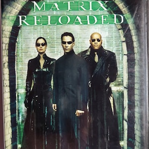 DVD 203 Vintage Movie titled Matrix Reloaded staring Keanu Reeves, Laurence Fishburne & Carrie-Anne Moss