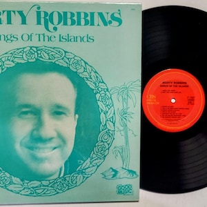 Vintage 1983 Vinyl Record Album by Marty Robbins titled Songs Of The Islands