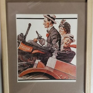 Framed and matted 11 x 13 art print by Norman Rockwell titled Trio in Early Motor Car from the Saturday Evening Post