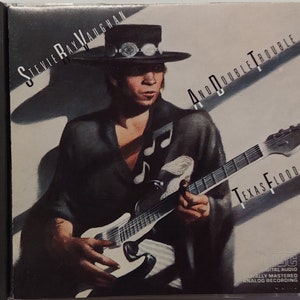 CD 1983 Vintage Blues Music by Stevie Ray Vaughn and Double Trouble titled Texas Flood