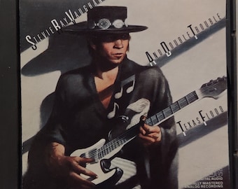 CD 1983 Vintage Blues Music by Stevie Ray Vaughn and Double Trouble titled Texas Flood