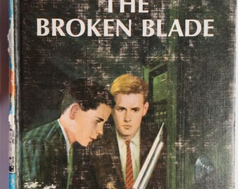 Hardcover book 1942 Vintage Music by ranklin W. Dixon titled The Hardy Boys The Clue of the Broken Blade Volume 21