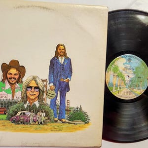 Vintage 1975 Vinyl Record Album by America titled History titled  America's Greatest Hits
