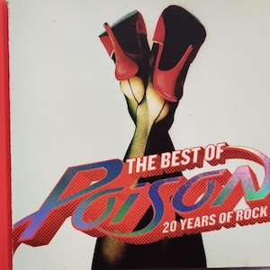 May include: CD case featuring the album "The Best of Poison: 20 Years of Rock." The cover art displays a pair of high-heeled shoes in red and black, with the band's name in a vibrant, multi-colored font.