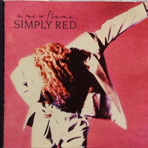 CD Used  1990 Vintage Rock Music by Simply Red titled A New Flame