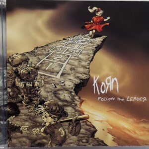CD Used  1998 Vintage Music by Korn titled Follow The Leader