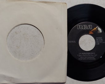 Vintage 1977 Vinyl, 7", 45 RPM, Single by Waylon Jennings titled The Wurlitzer Prize (I Don't Want To Get Over You)