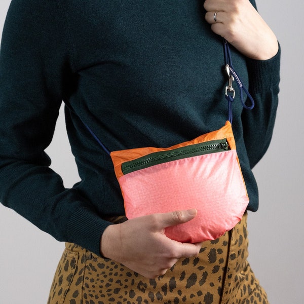 Ultra Light Small crossbody bag for Women and Men made from recycled lightweight nylon. Sling bag handmade in Berlin