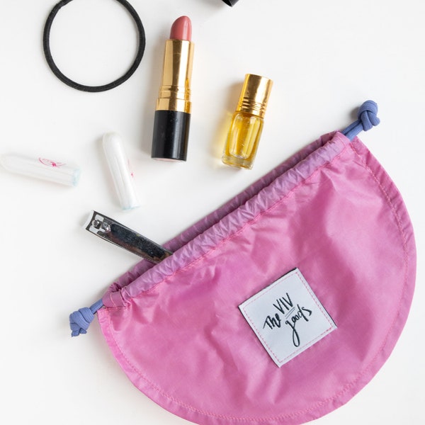 Single Drawstring Pouch made from ultralight recycled ripstop nylon. Perfect for travel jewellery, toiletries or lipstick case