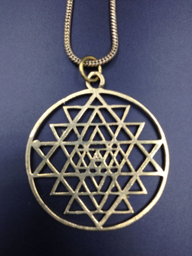 Shri yantra brass pendant.