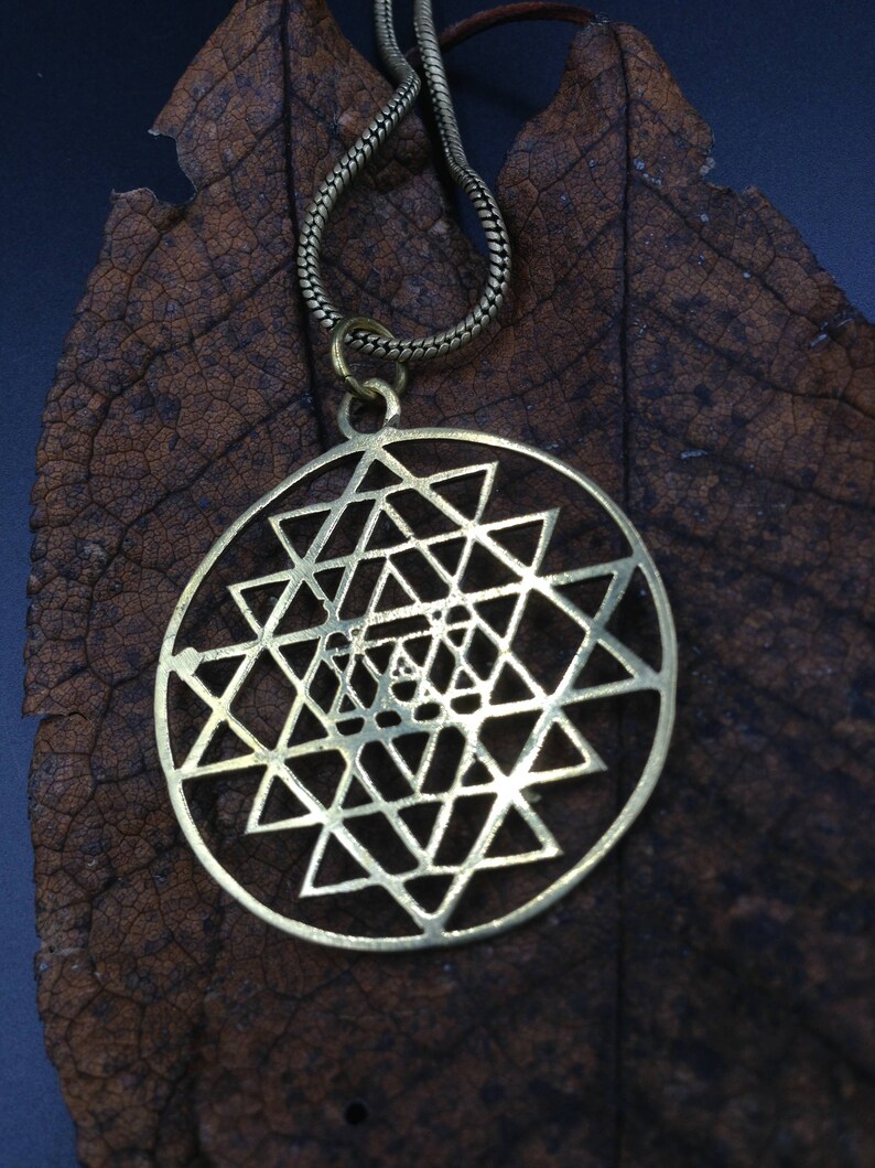 Shri yantra brass pendant.