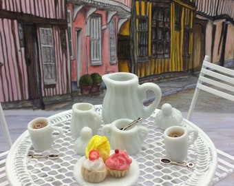 Miniature Coffee and Cupcakes for two. A classic design coffee set with two white mugs and a plate of three fruit cupcakes.