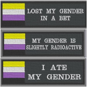 May include: Three embroidered patches with a yellow, white, and purple genderqueer flag. The text on the patches reads "Lost my gender in a bet", "My gender is slightly radioactive", and "I ate my gender".