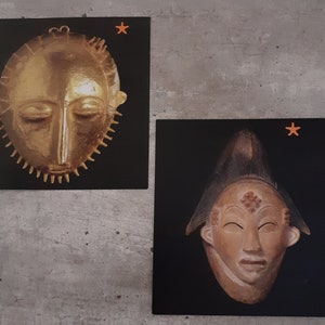 Two African jewelry and mask postcards