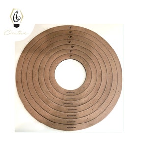 May include: A set of concentric wooden circles, ranging from 6 to 18 inches in diameter, with evenly spaced holes. The circles are labeled with their respective sizes. The brand name "Creative" and the website "66creative.com" are also visible.