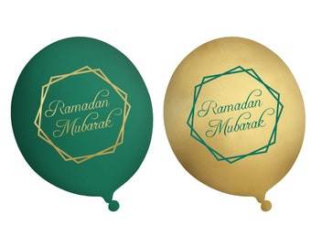 May include: Two balloons, one emerald green and one gold, are displayed. Each balloon features the text "Ramadan Mubarak" in elegant script within a gold geometric frame. The balloons are designed for festive occasions.