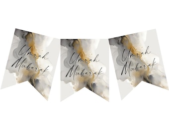 May include: Three white pennant flags with gold and black marbled designs. Each flag has the text "Umrah Mubarak" written in black calligraphy.