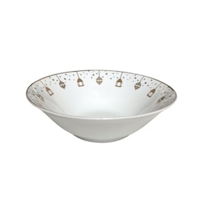 May include: White ceramic bowl with a gold rim and a pattern of hanging lanterns and stars.
