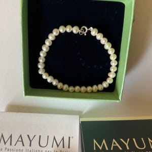 Perlenarmband, mit Zertifikat