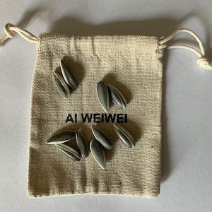 Ai Weiwei - 10 Porcelain Seeds, including Linen Bag