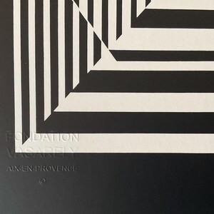 May include: Black and white abstract geometric art print with a white border and the text "Fondation Vasarely Aix-en-Provence" in the bottom right corner.