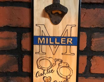 Personalized wall mounted bottle opener