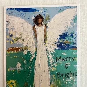 Angel Christmas card on quality paper stock with Merry &Bright wording. image 1