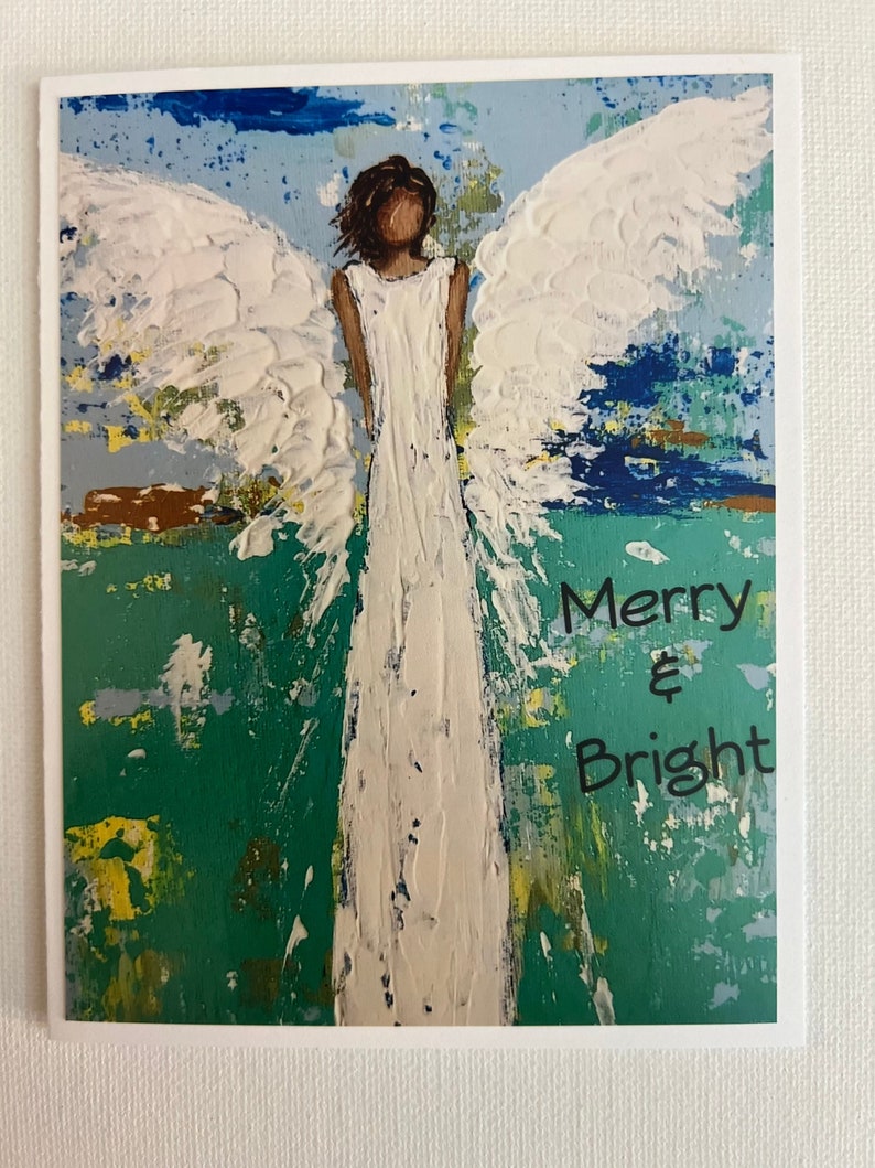 Angel Christmas card on quality paper stock with Merry &Bright wording. image 1