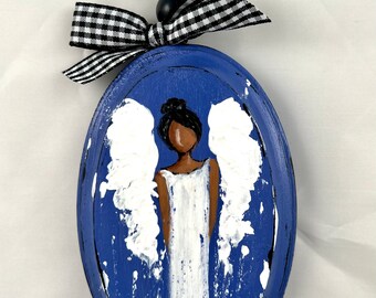African American Angel wood ornament with decorative beads and bow