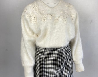 white fuzzy jumper