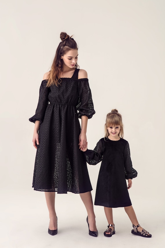 little girl in black dress