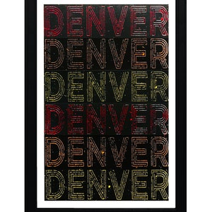 May include: A black framed print with the word "DENVER" repeated six times in a gradient of red, orange, and yellow. The background is black with white paint splatters.