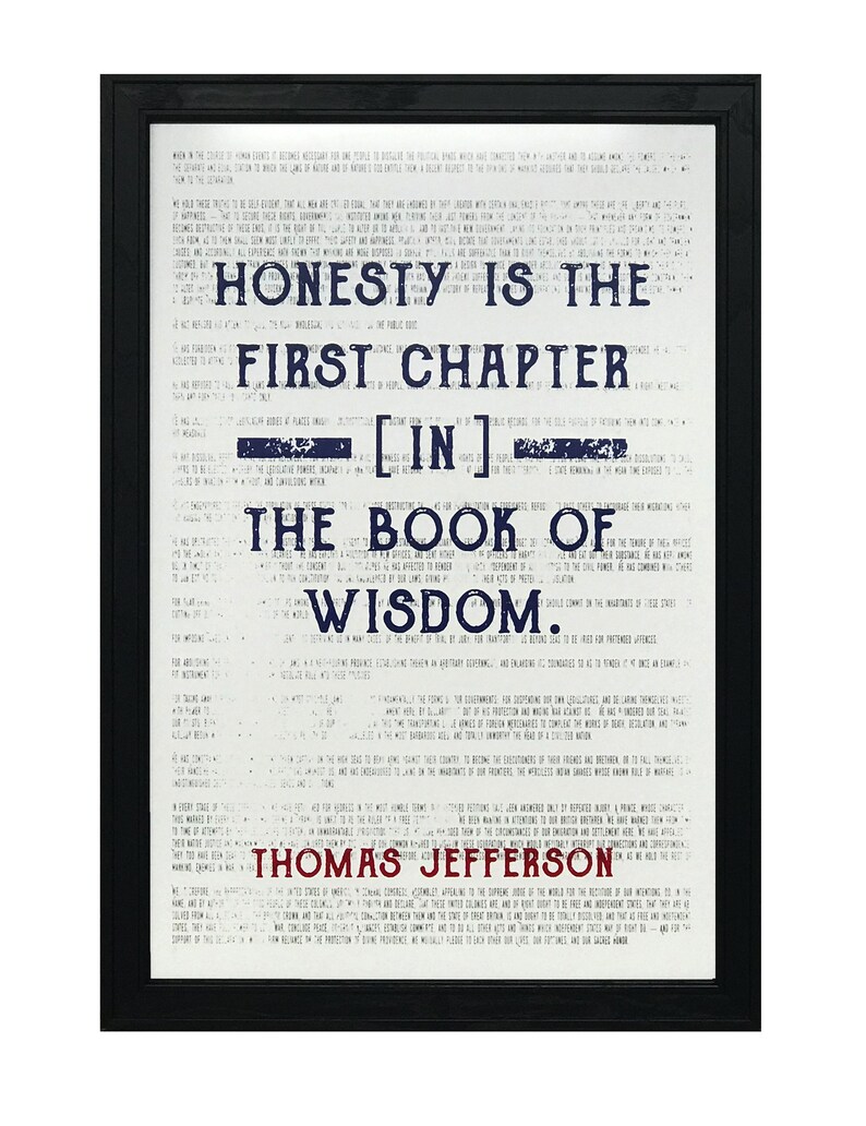 May include: Framed print with the quote "Honesty is the first chapter in the book of wisdom" by Thomas Jefferson. The text is in navy blue on a white background, with a black frame. The print has a vintage, aged appearance.