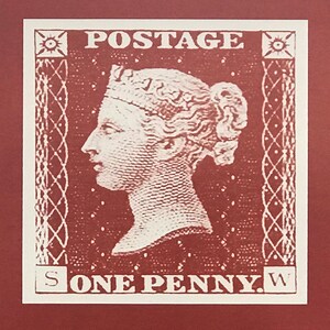 May include: A vintage red postage stamp with a white image of Queen Victoria's profile and the text "POSTAGE" and "ONE PENNY."