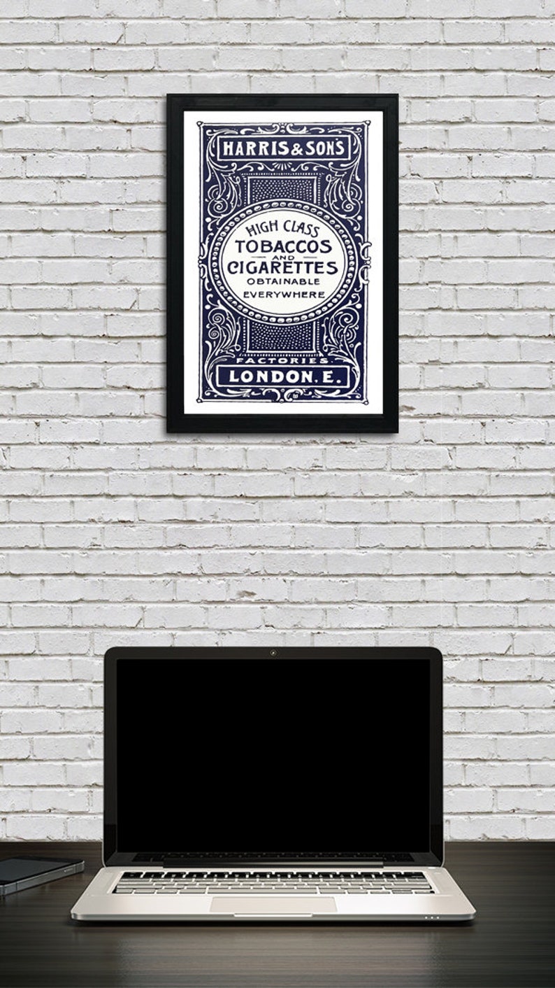 May include: A vintage advertisement for Harris & Sons high class tobaccos and cigarettes, featuring an ornate blue and white design with the text "Factories London E."