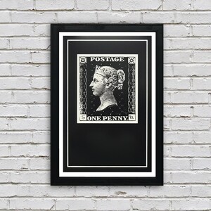 May include: Black and white print of a vintage postage stamp featuring a portrait of Queen Victoria with the text "POSTAGE" and "ONE PENNY" on a black background.