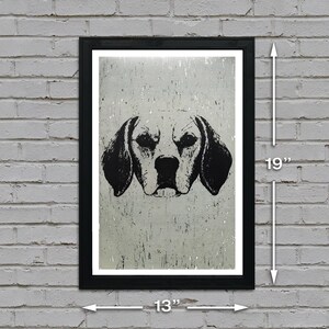 May include: Black and white illustration of a dog's head, printed on a textured, light grey background. The image is framed in a black frame, measuring 13 inches wide by 19 inches tall.