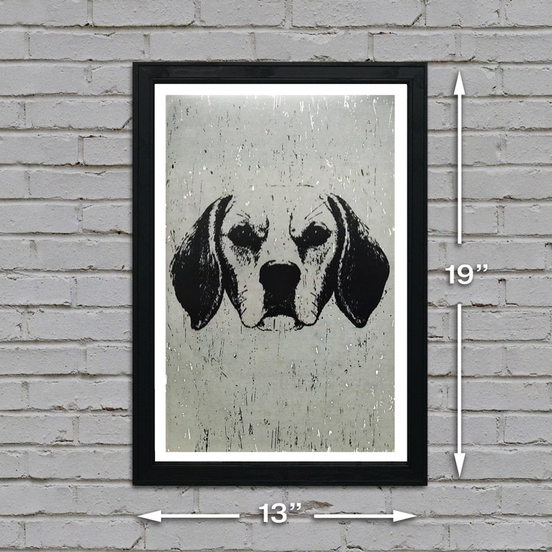 May include: Black and white illustration of a dog's head, printed on a textured, light grey background. The image is framed in a black frame, measuring 13 inches wide by 19 inches tall.