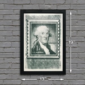 May include: A black framed print of a vintage 1 cent US postage stamp featuring George Washington. The stamp is green and white with the text "1&cent; U.S. POSTAGE" and "WASHINGTON". The print measures 13 inches wide by 19 inches tall.