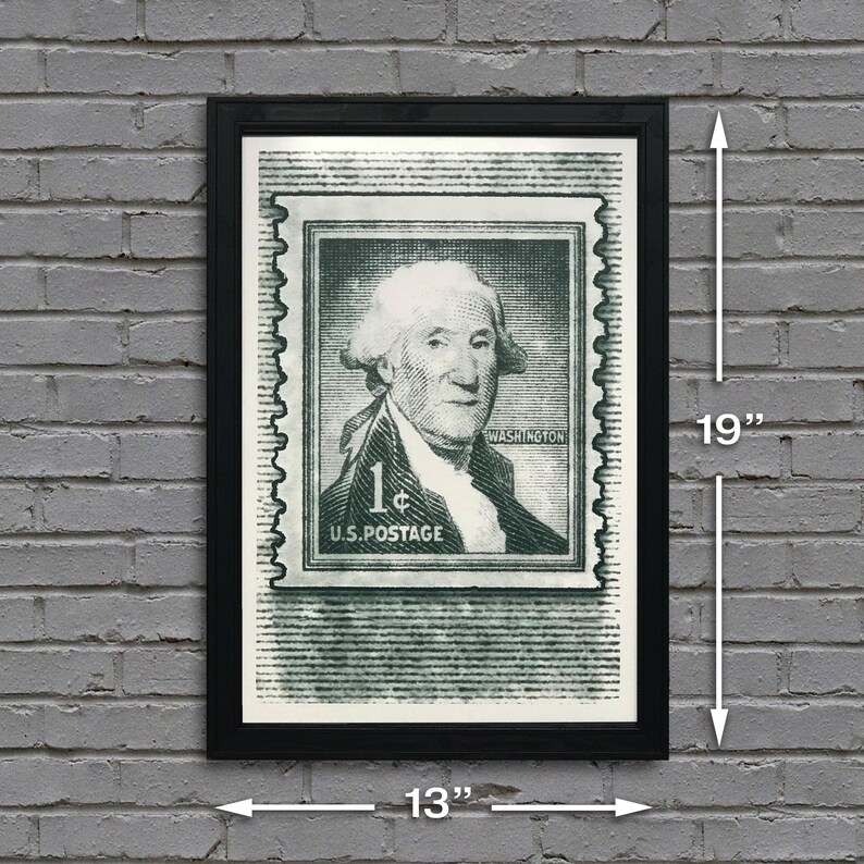 May include: A black framed print of a vintage 1 cent US postage stamp featuring George Washington. The stamp is green and white with the text "1&cent; U.S. POSTAGE" and "WASHINGTON". The print measures 13 inches wide by 19 inches tall.