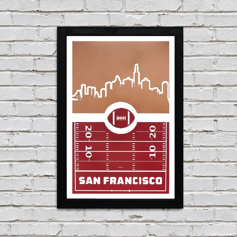 May include: A red and brown poster with a white outline of the San Francisco skyline. The poster features a football field with yard lines and a football in the center. The text "SAN FRANCISCO" is printed at the bottom of the poster.